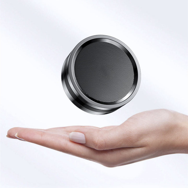 Experience Music Anywhere with the Portable Wireless Small Steel Gun Bluetooth Speaker